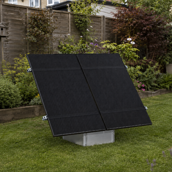 GSE Ground System Evolution mounting system with all-black panels positioned in a garden